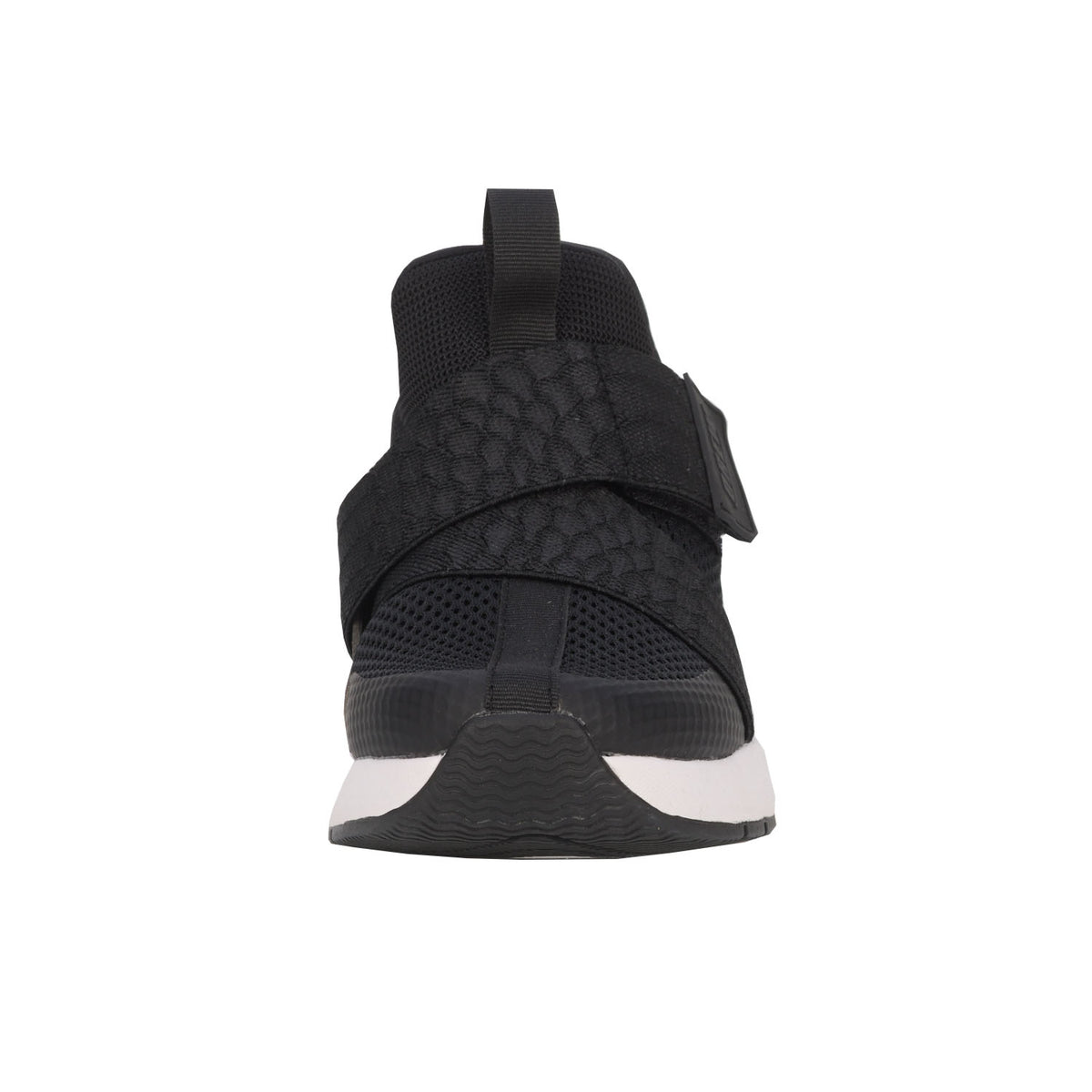 Black sneaker with white sole on a white background