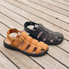 Group picture of two Hunter sandals side-by-side on dock from angled top down view