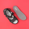 Top down view of the attractive Black Hudson footwear with the removable & comfortable extra-cushioned insole beside it.  