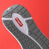 Rubber grips for traction on a lightweight EVA foam midsole.