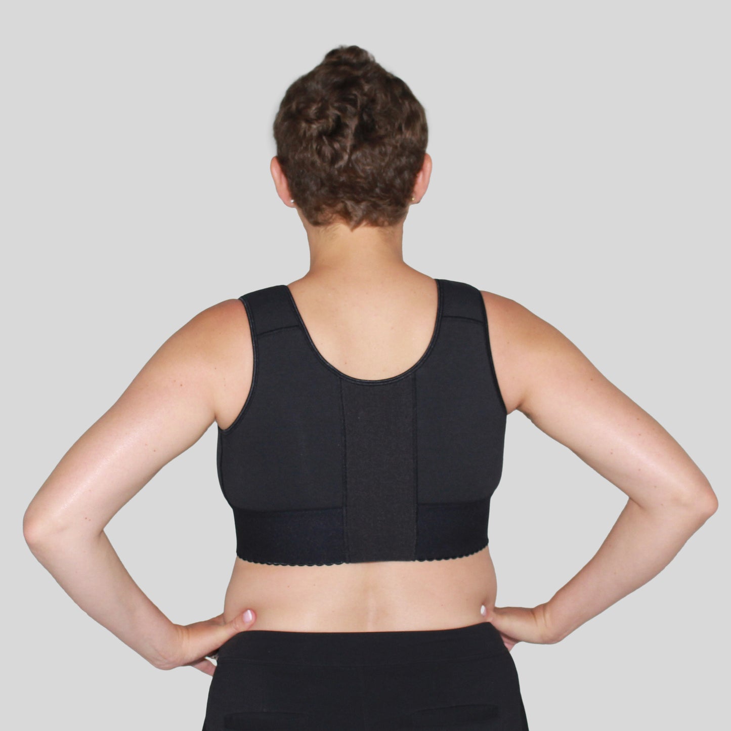 Woman wearing Black ABC 619 Restore Bra showing the back panel.