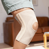 Lifestyle image of someone wearing the Actimove Knee Support Open Patella, 4 Stays inside.