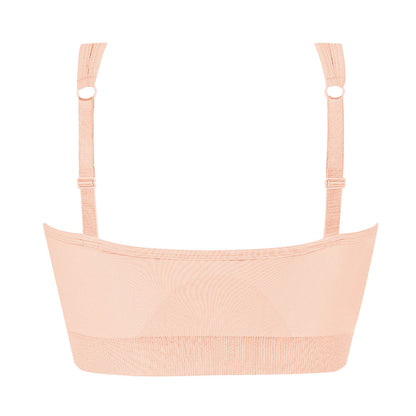 A light peach-colored seamless underwire bra with adjustable shoulder straps and a wide, comfortable band, shown against a plain white background.