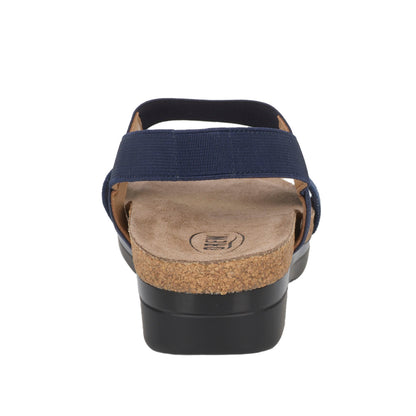 Navy sandal with cork sole on a white background