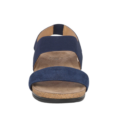 Navy blue sandal with cork sole on a white background