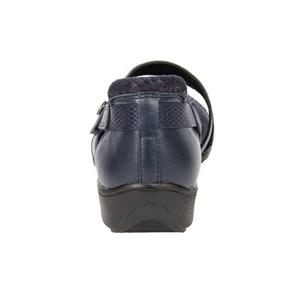 Navy blue shoe with a strap on a white background