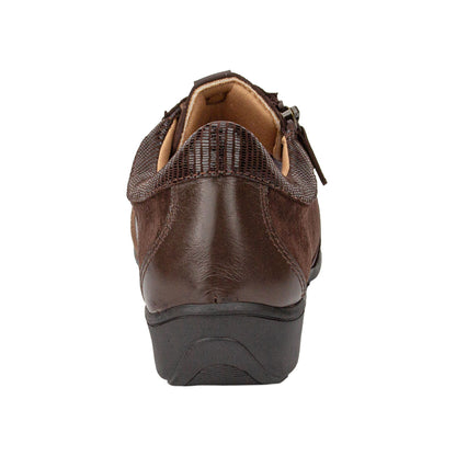 Brown shoe with a tan sole on a white background