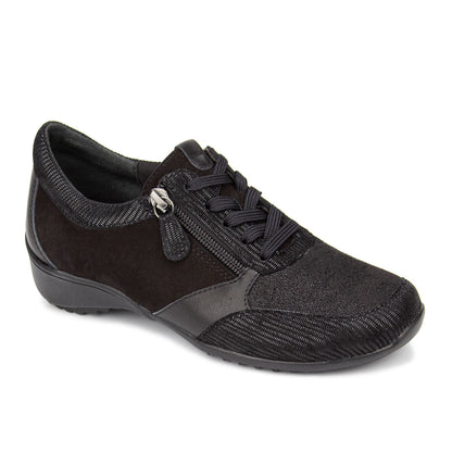Black casual shoe with a zipper on a white background