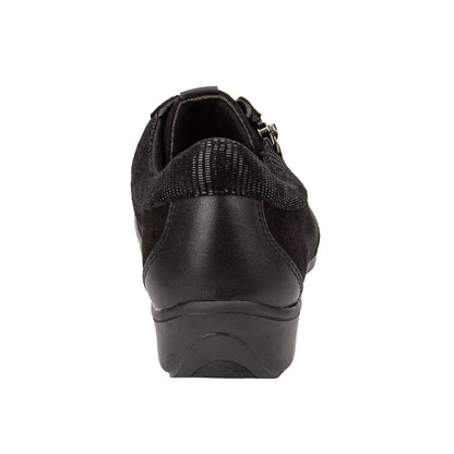 Black shoe with a wedge sole on a white background