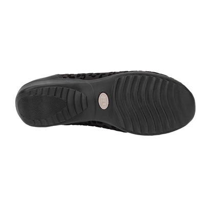 Black shoe sole with brand logo on a white background