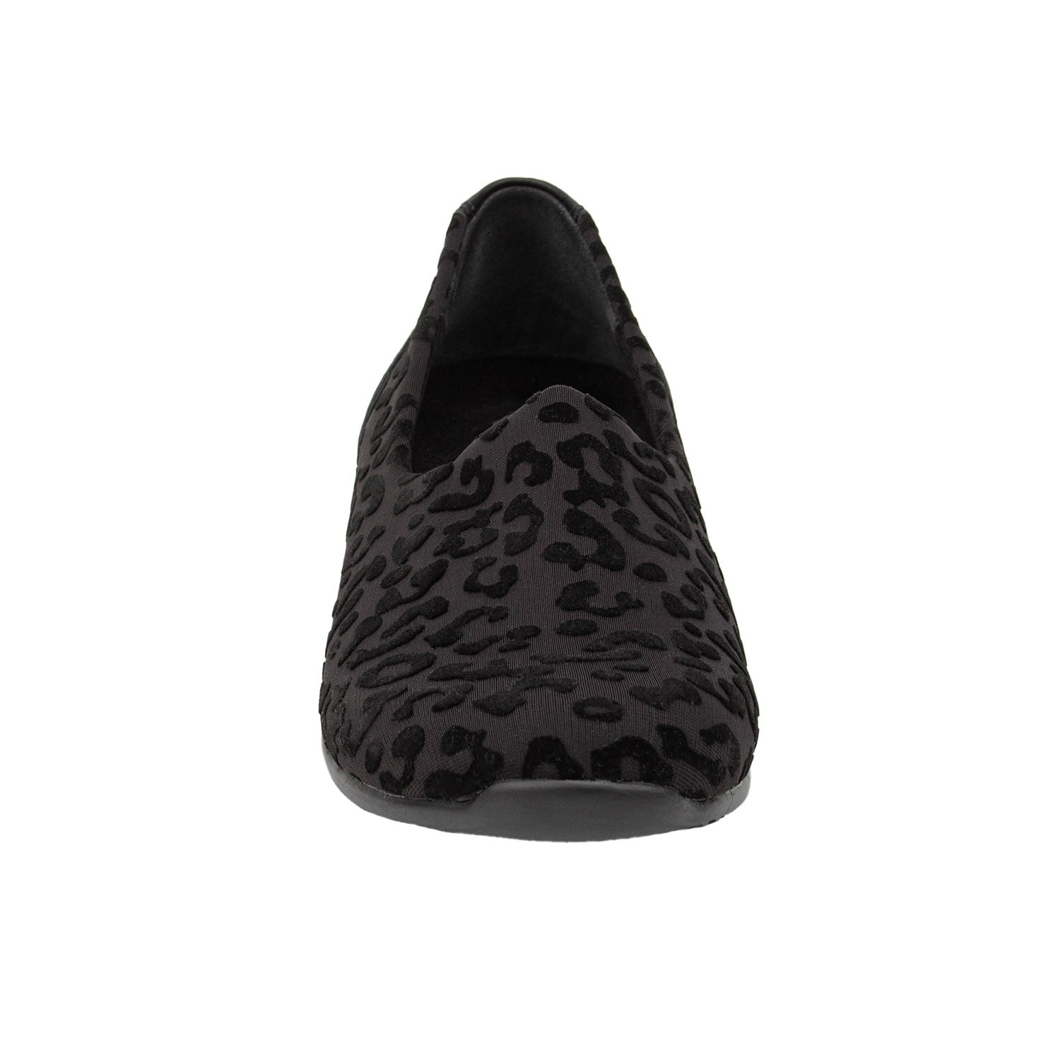 Black loafer with leopard print pattern on a white background