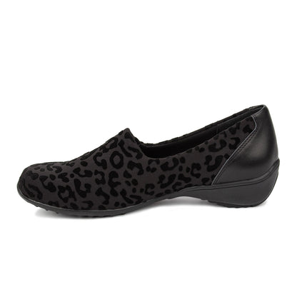 Black leather shoe with a strap on a white background