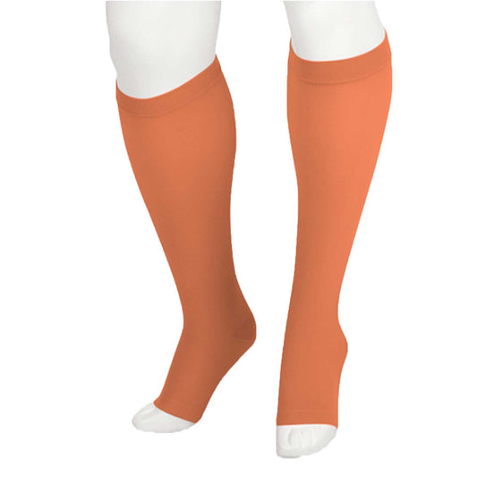 Juzo 2002 Soft Open Toe Knee Highs 30-40 mmHg - A pair of knee-high compression stockings in a solid orange color, shown on a white mannequin leg form against a plain white background.