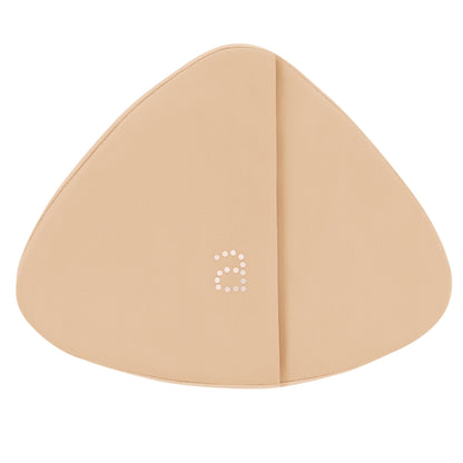Beige triangular breast form on a white background