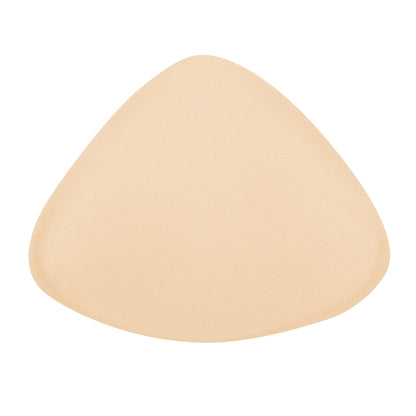 Beige bra pad on a white background