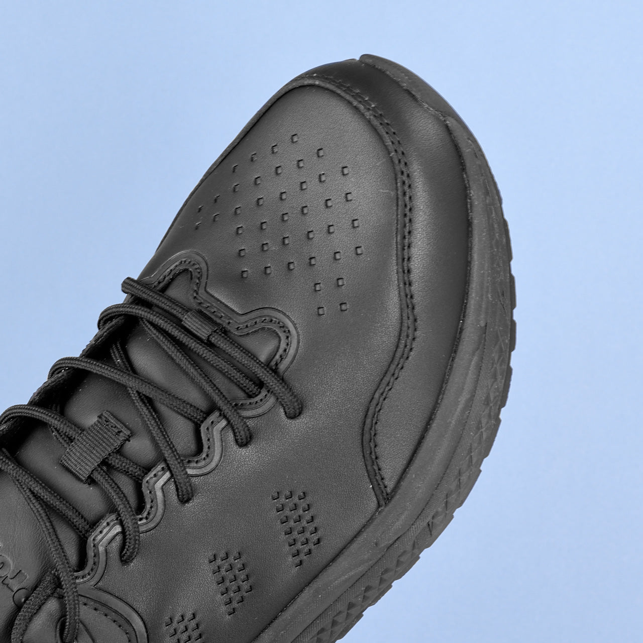 Propet Men's Ultra Leather Sneaker Black Sneaker with laces Close up toe box