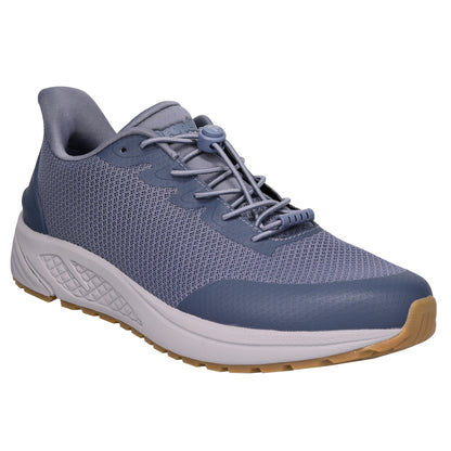 Blue athletic shoe with a white sole on a white background