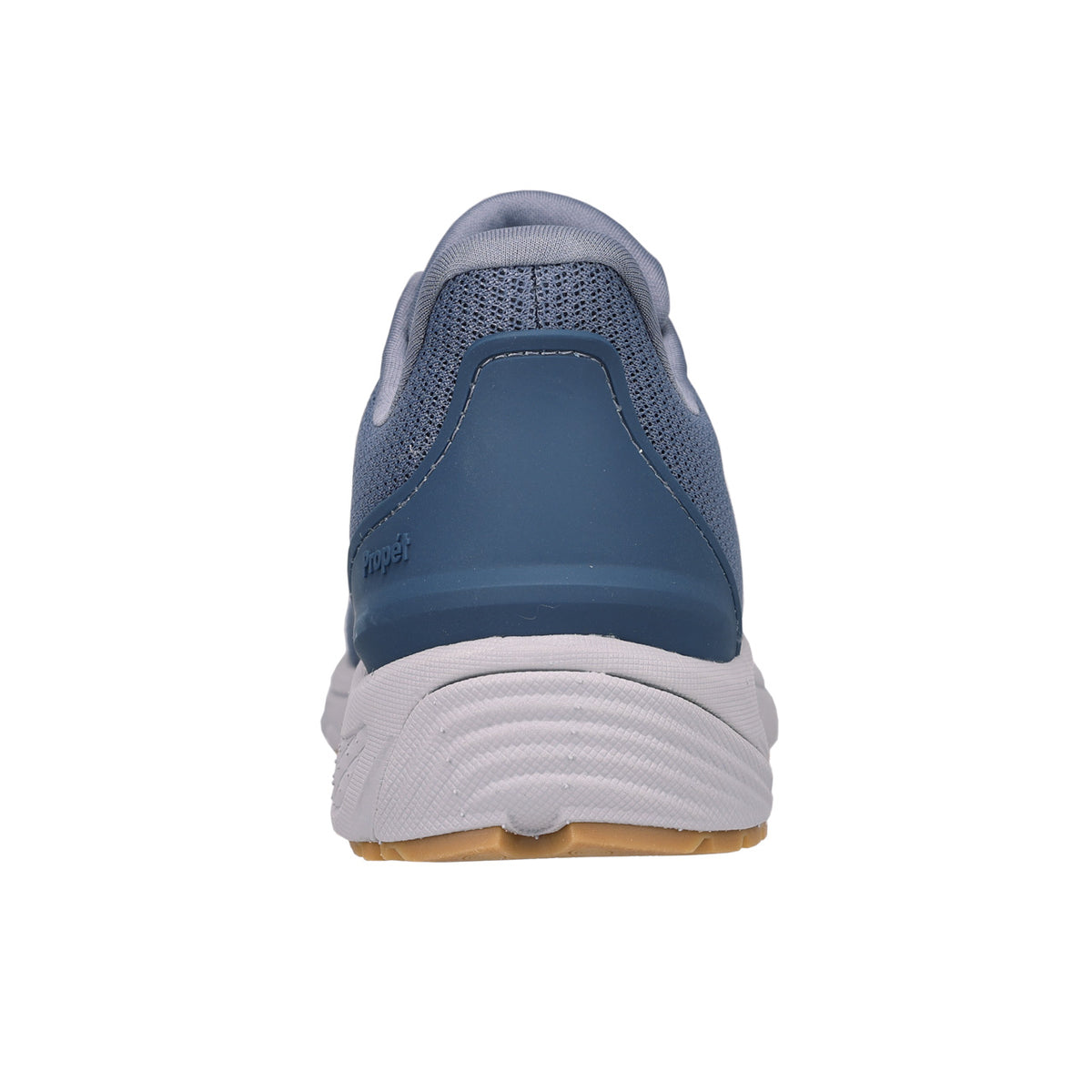 Blue athletic shoe with white sole on a white background