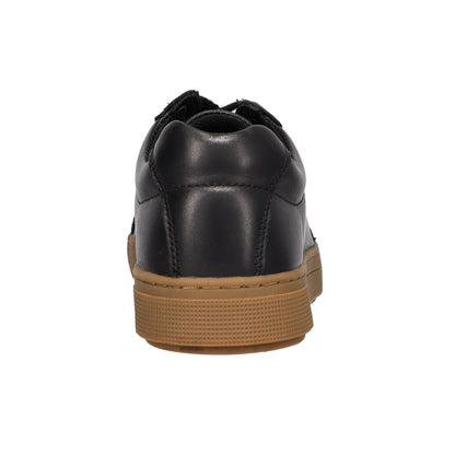 A black leather low-top sneaker shown from a rear three-quarter view, featuring a tan rubber sole, set against a plain white background.