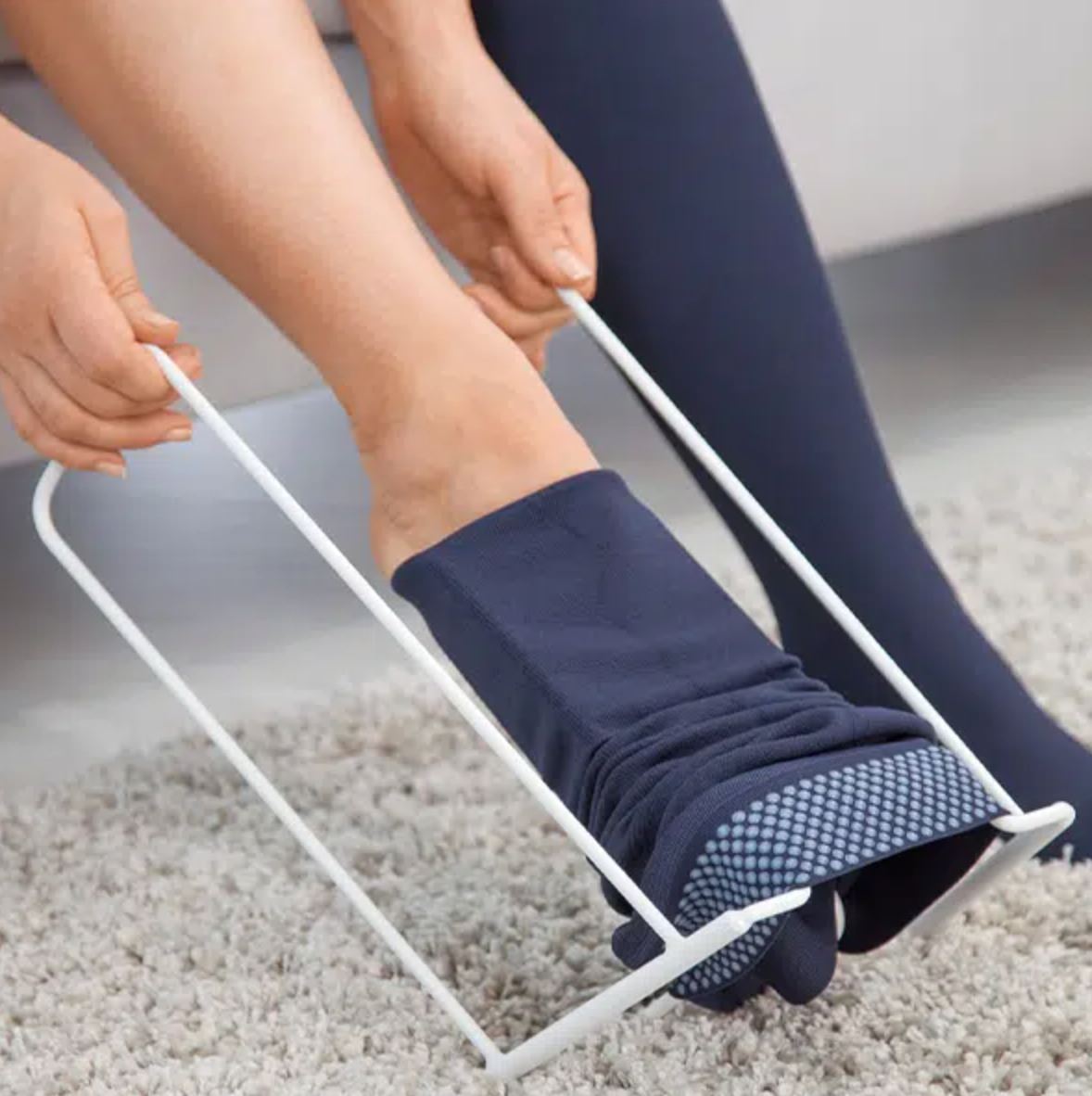 Person using the Medi Big Butler