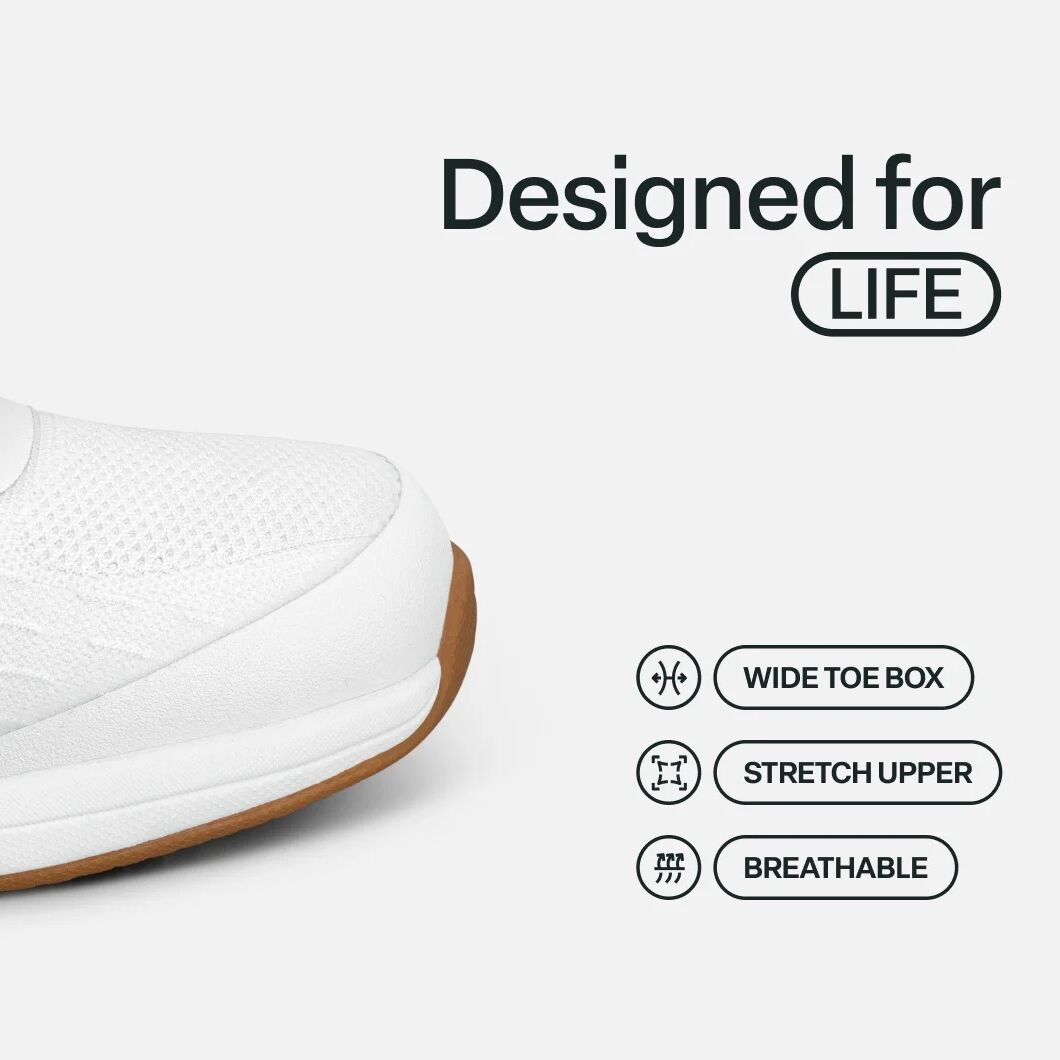 White shoe with brown sole on a light gray background, featuring 'Designed for LIFE' text and features.