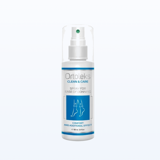 Ortoleks Spray for Ease of Donning - A white plastic spray bottle of Ortolek Clean & Care spray for ease of donning, featuring a blue and white label with a graphic of crossed legs, set against a plain white background.