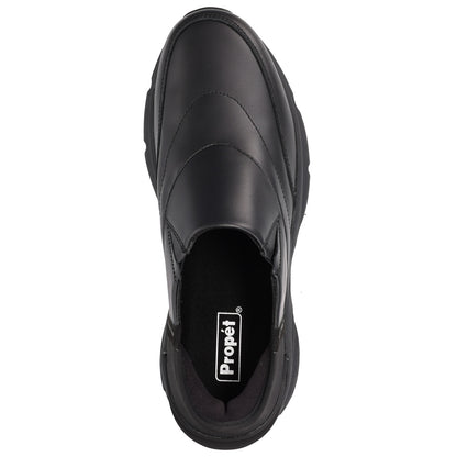 A black slip-on shoe shown from a top-down view on a plain white background, with the Propét brand name visible on the inner sole.