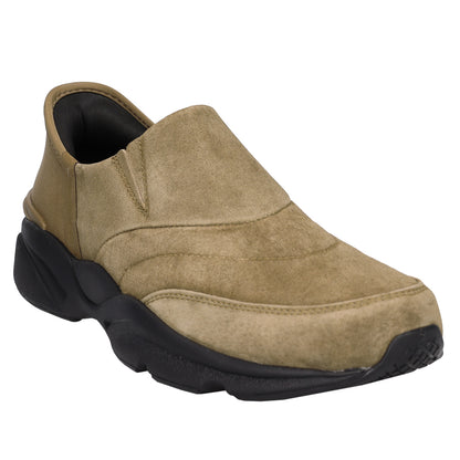 A slip-on casual shoe in tan suede with a chunky black sole, shown from a three-quarters angle on a white background.