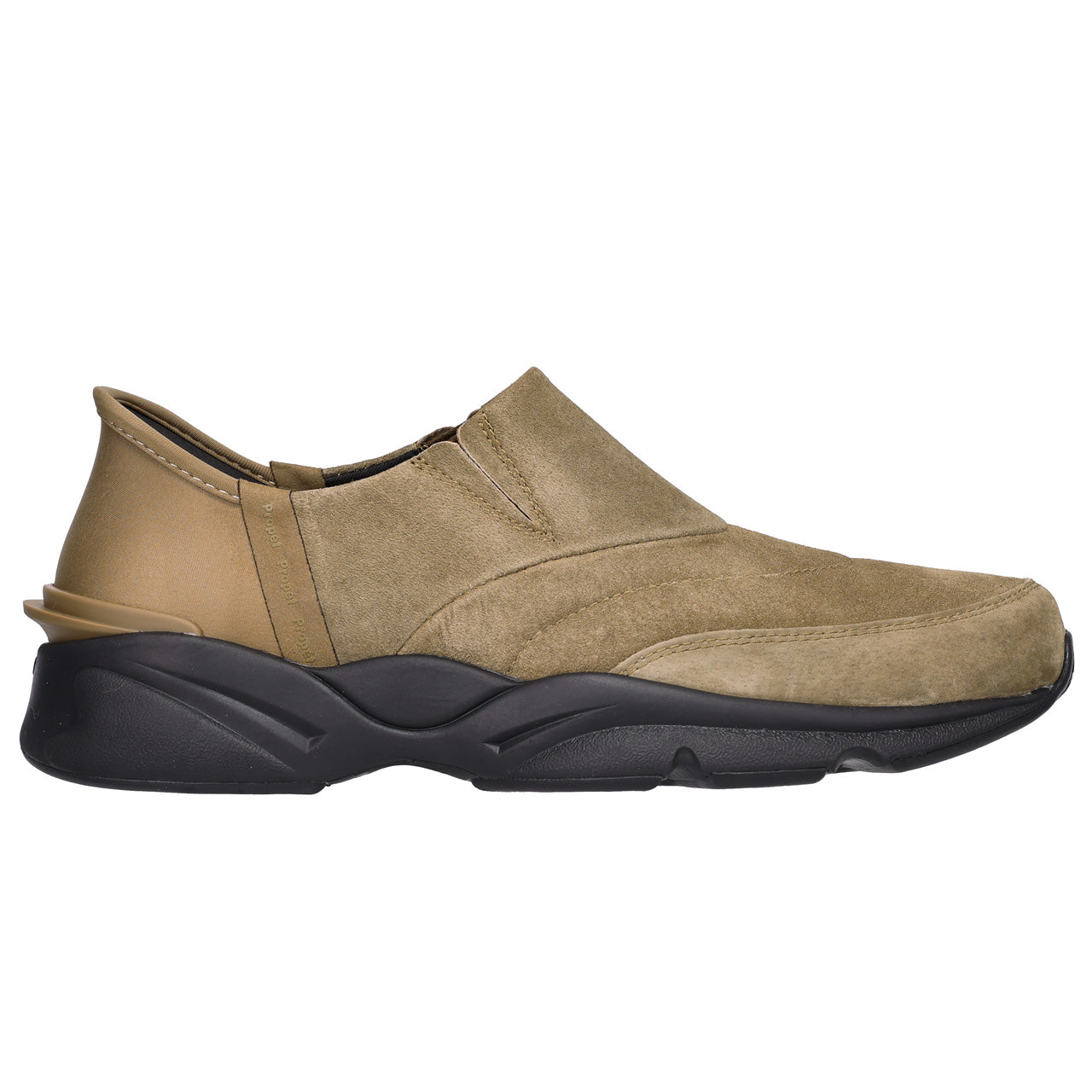 A slip-on casual shoe in tan suede and leather with a chunky black sole, shown from a side profile view on a white background.