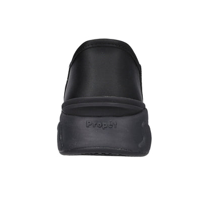 A black slip-on shoe shown from the back, featuring a thick textured sole with the brand name 'Propét' embossed on the side, set against a plain white background.