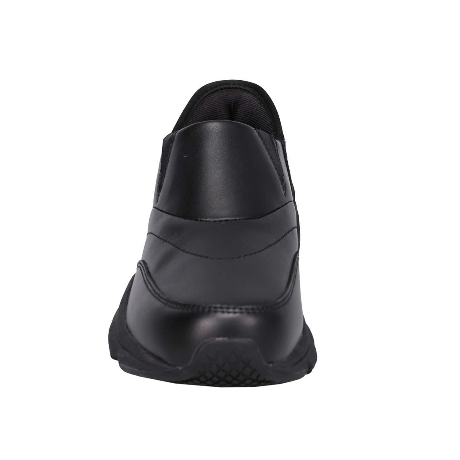 A black slip-on shoe shown from a rear three-quarter view against a plain white background.