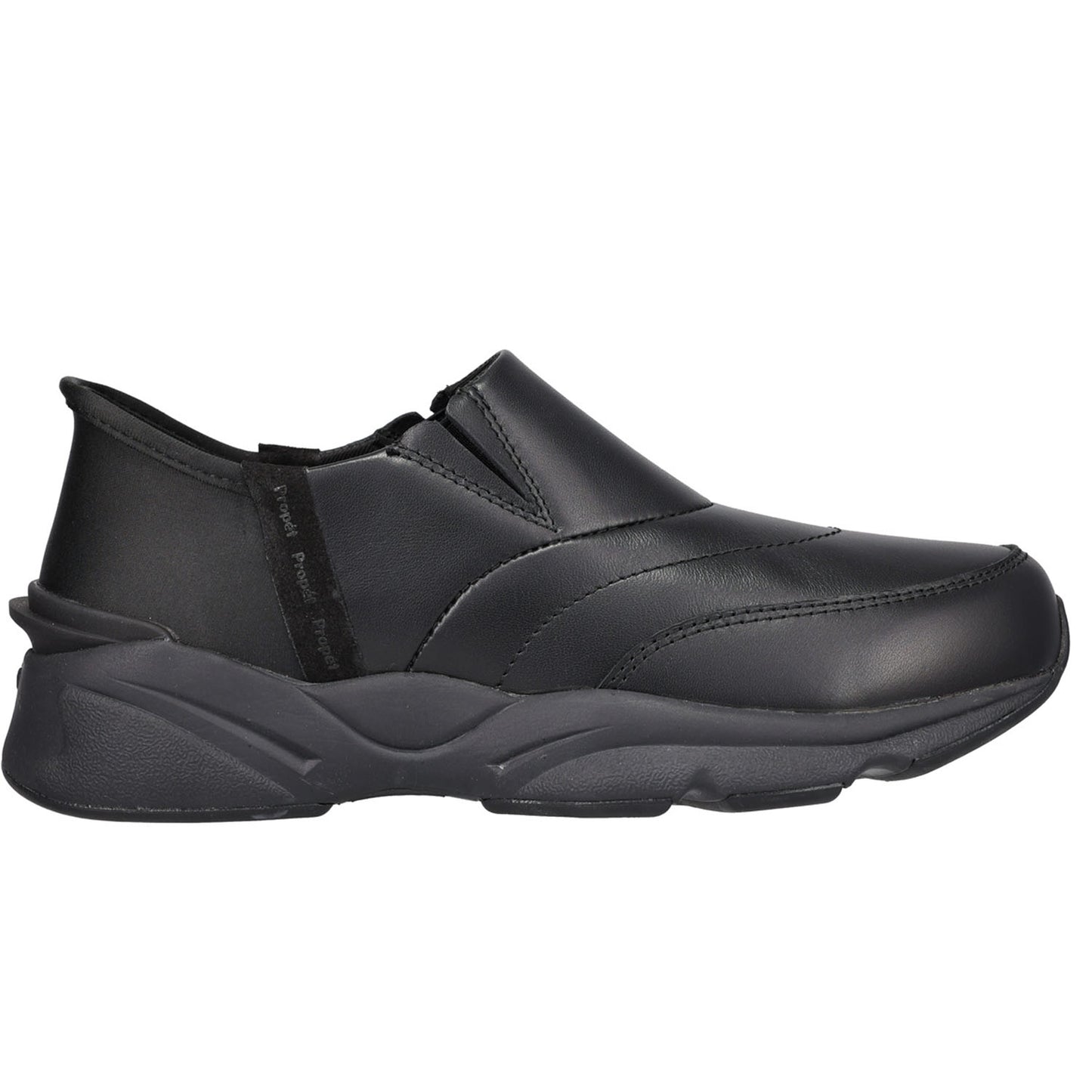 A black slip-on work shoe with a smooth synthetic upper and a chunky, sculpted black sole, shown from a side profile on a white background.