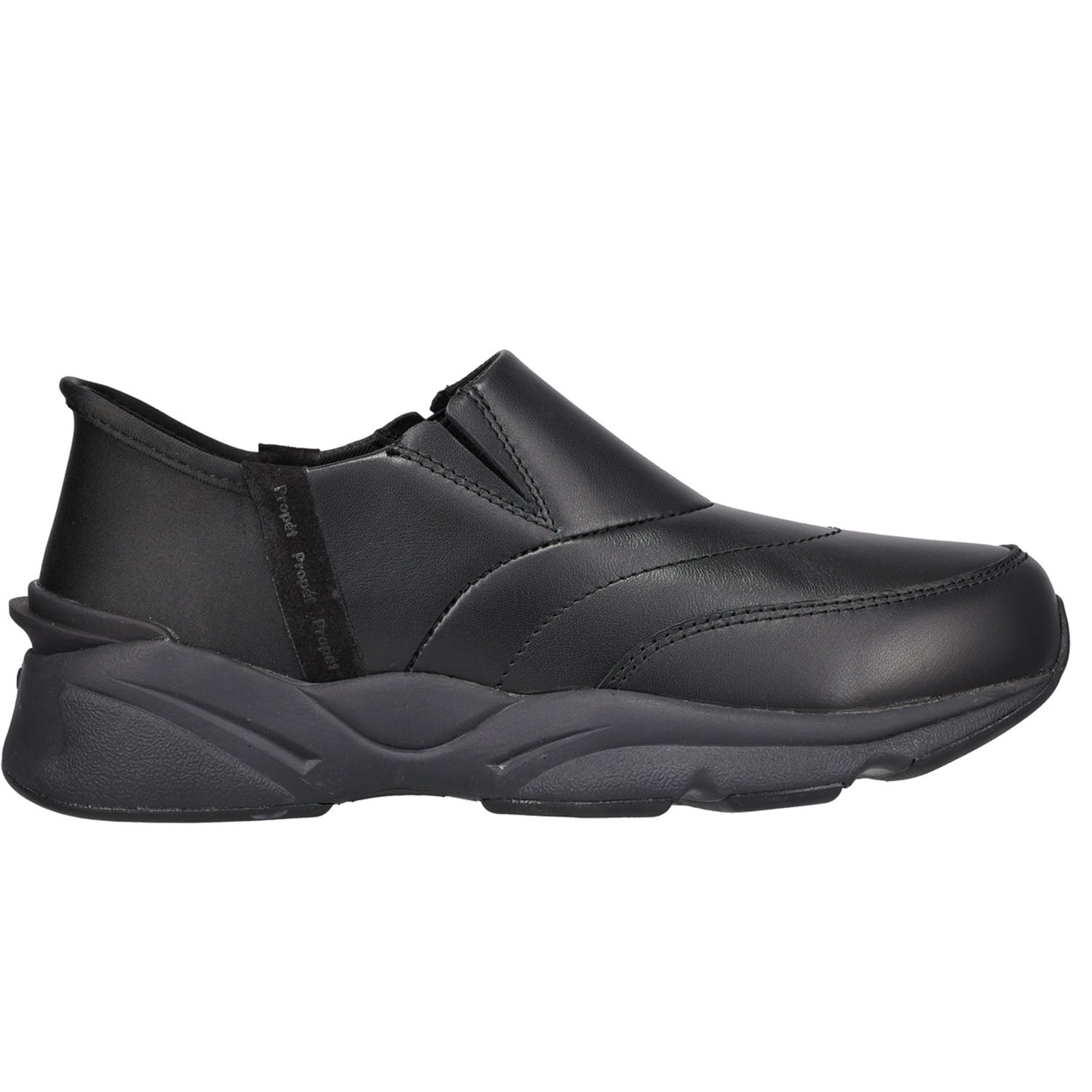 A black slip-on work shoe with a smooth synthetic upper and a chunky, sculpted black sole, shown from a side profile on a white background.