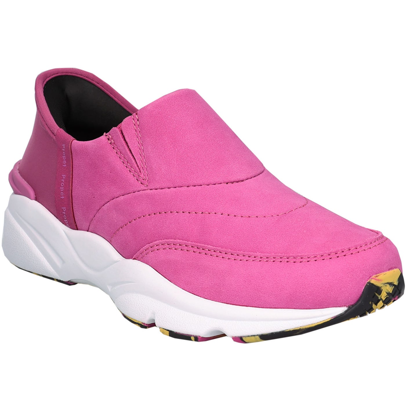 A pink slip-on sneaker with a thick white midsole and a small yellow and black patterned accent on the toe, shown against a plain white background.