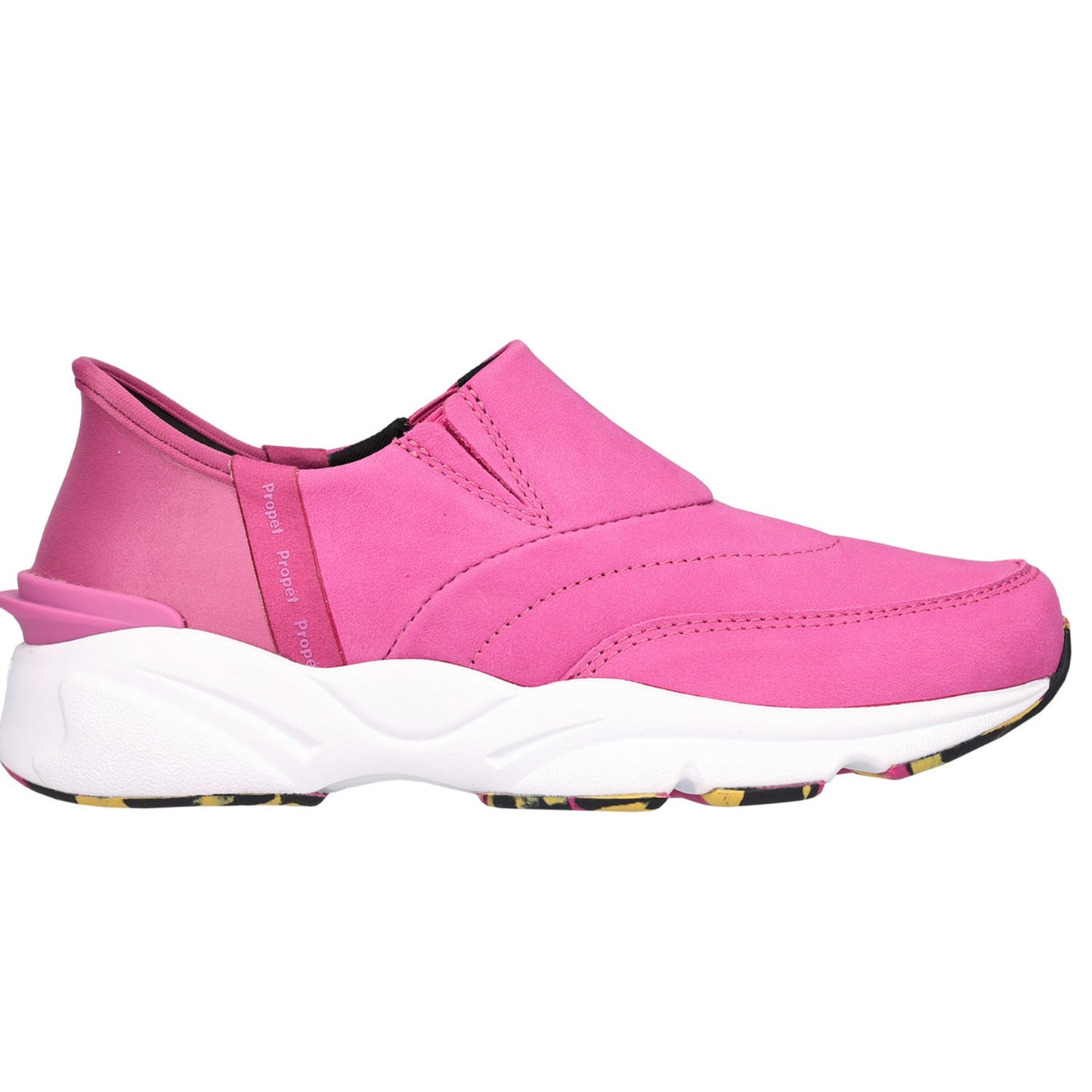 A pink slip-on sneaker with a chunky white sole and a small multicolor patterned outsole, shown from a side profile on a white background.