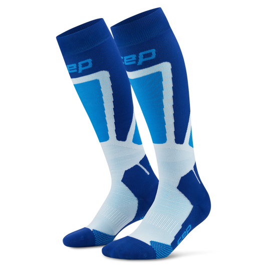 CEP Men's Ski Thermo Tall Socks - A pair of athletic knee-high socks in blue, white, and light blue, featuring the brand logo 'Cep' on the upper leg, shown against a plain white background.