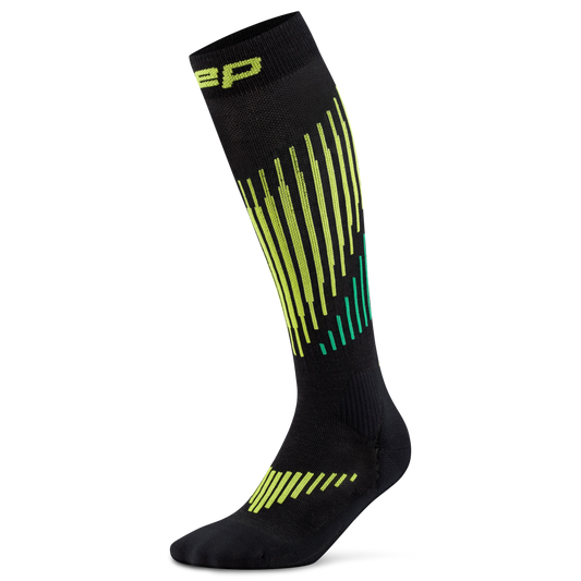 CEP Men's Ski Touring Merino Tall Socks - A single knee-high athletic sock in black with neon yellow-green and teal stripe patterns, shown on a white background.